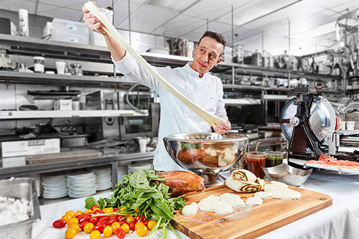 Chef Jimmy Perides making fresh mozzarella at biagios